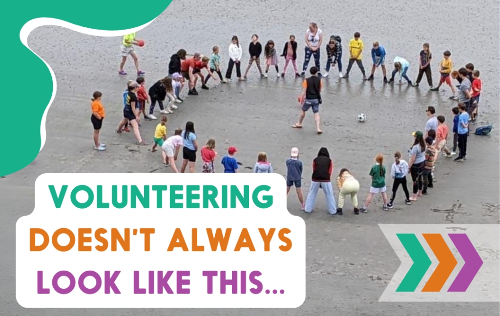 A group of children playing a game on the beach. Volunteering doesn't always have to look like this